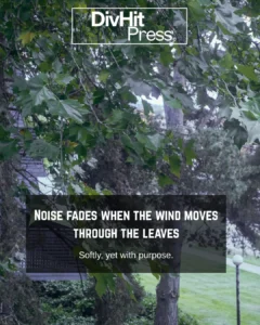 Close-up of green maple leaves swaying near heritage building window in Langley — peaceful nature photograph by DivHit Press.