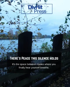 Riverside trail with wooden fence and autumn leaves in Fort Langley — serene landscape captured by DivHit Press, evoking peace and stillness.