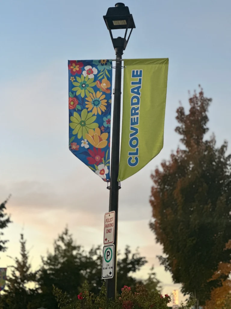 Cloverdale street banner under clear sky symbolizing local pride and community culture in British Columbia.